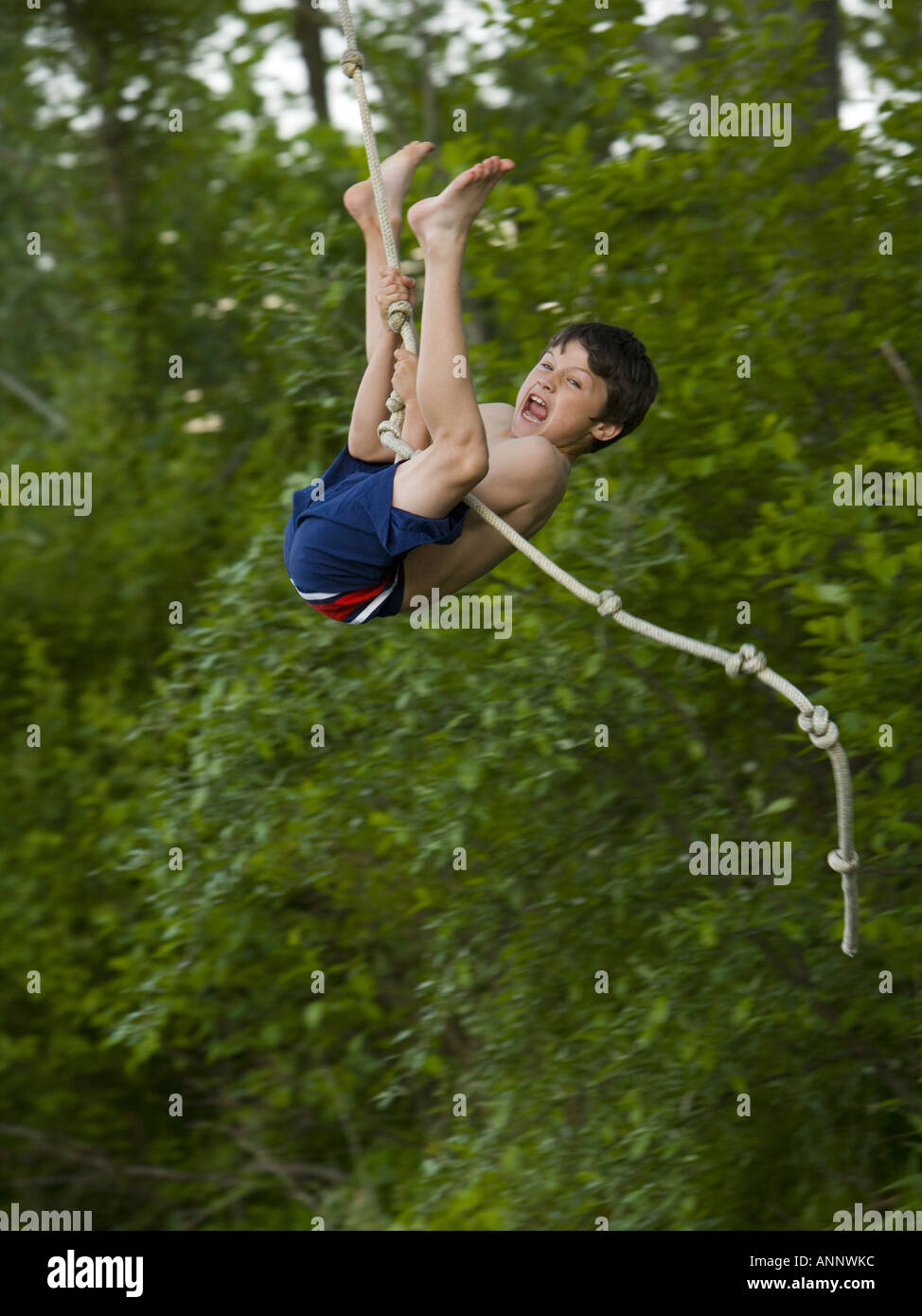 Profile Of A Boy Swinging On A Rope Hi res Stock Photography And Images profile-of-a-boy-swinging-on-a-rope-hi-res-stock-photography-and-images