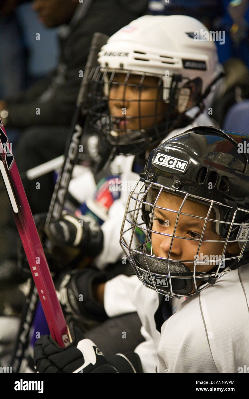AfricanAmerican children on youth ice hockey team Stock Photo Alamy