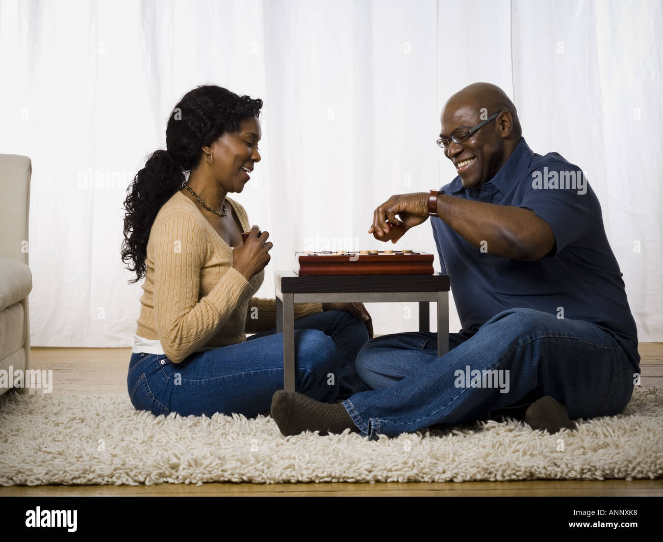 Mature couple playing a board game Stock Photo Alamy