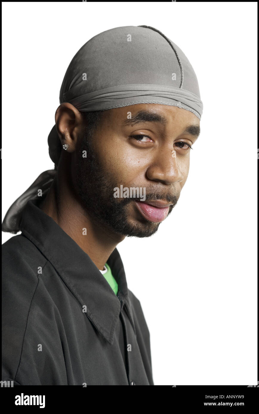 Portrait of a young man wearing a bandana Stock Photo - Alamy