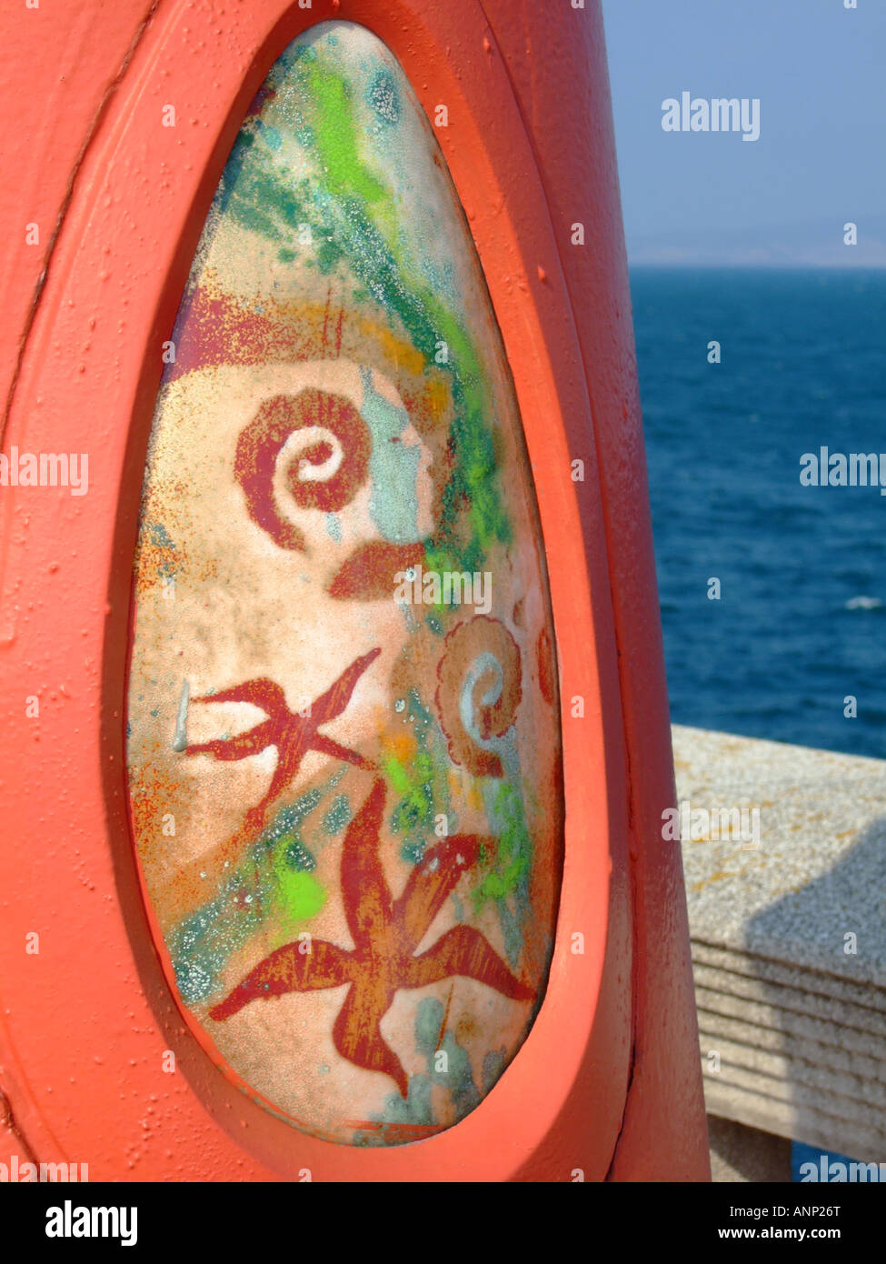 Mural on lamp post celebrating the famous local dish of Galicia - Pulpo a la Gallega.  Seafront of A Coruna. Stock Photo
