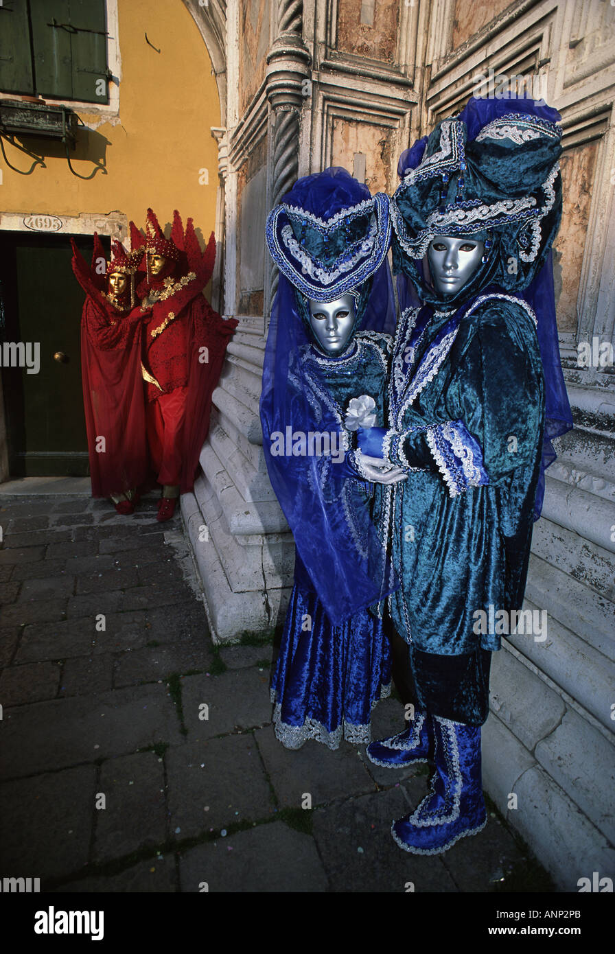 Men and women dressed in masquerade costumes Stock Photo - Alamy