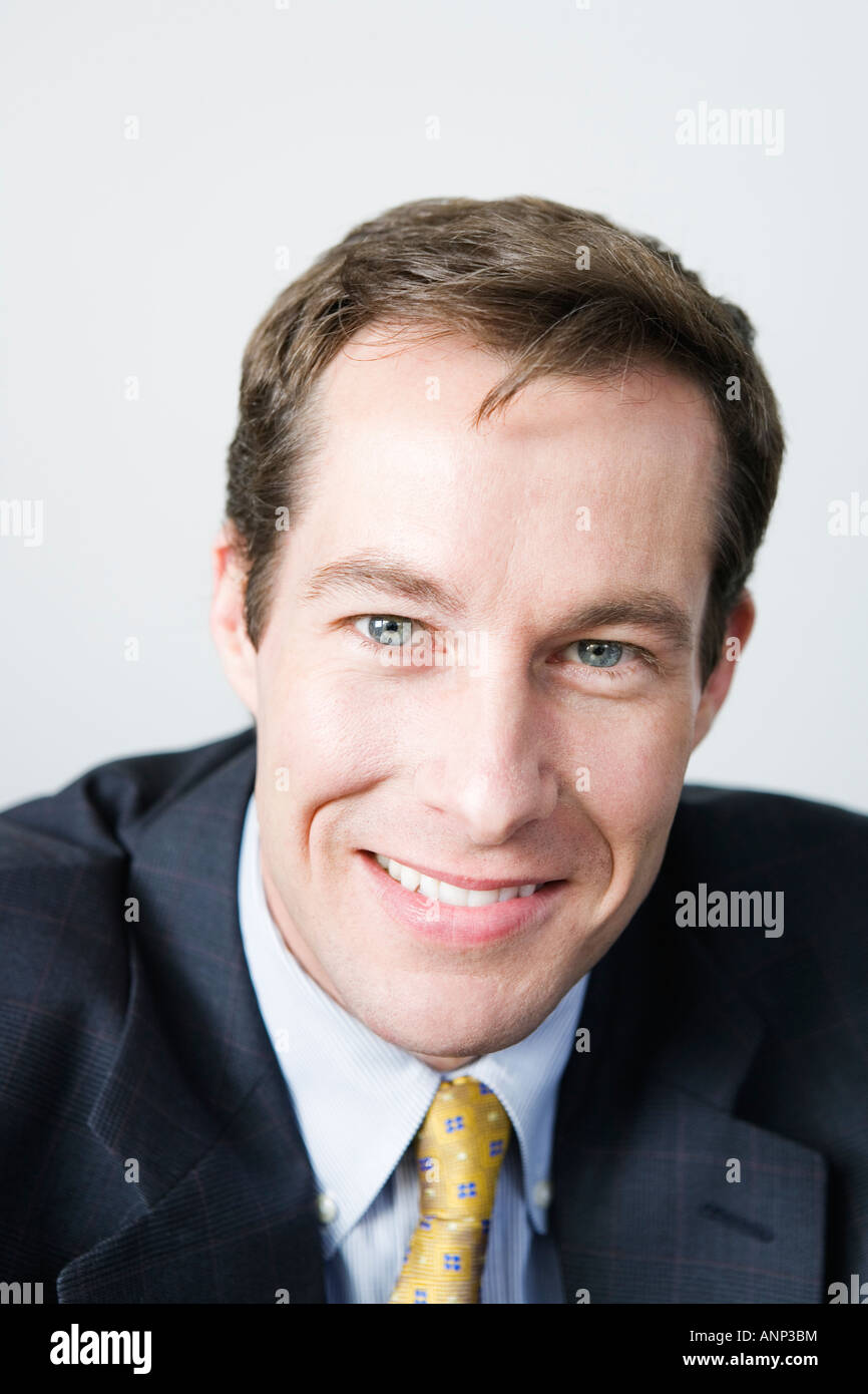 Portrait of a businessman smiling Stock Photo - Alamy