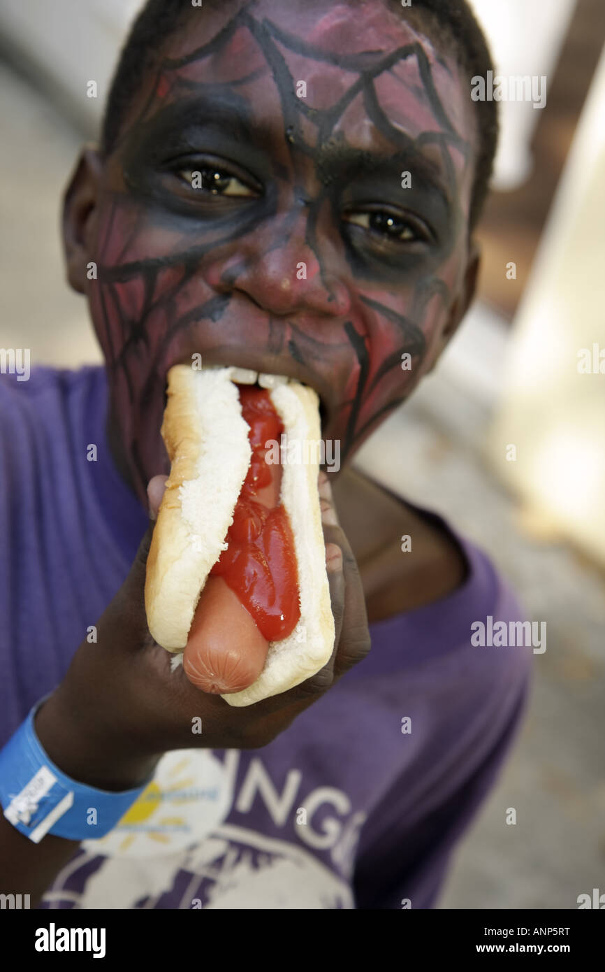 Miami Florida Black Boy Male Bites Eats Hot Dog Catsup Ketchup Food Miami Florida Black Boy Male Bites Eats Hot Dog Catsup Ketchup Food