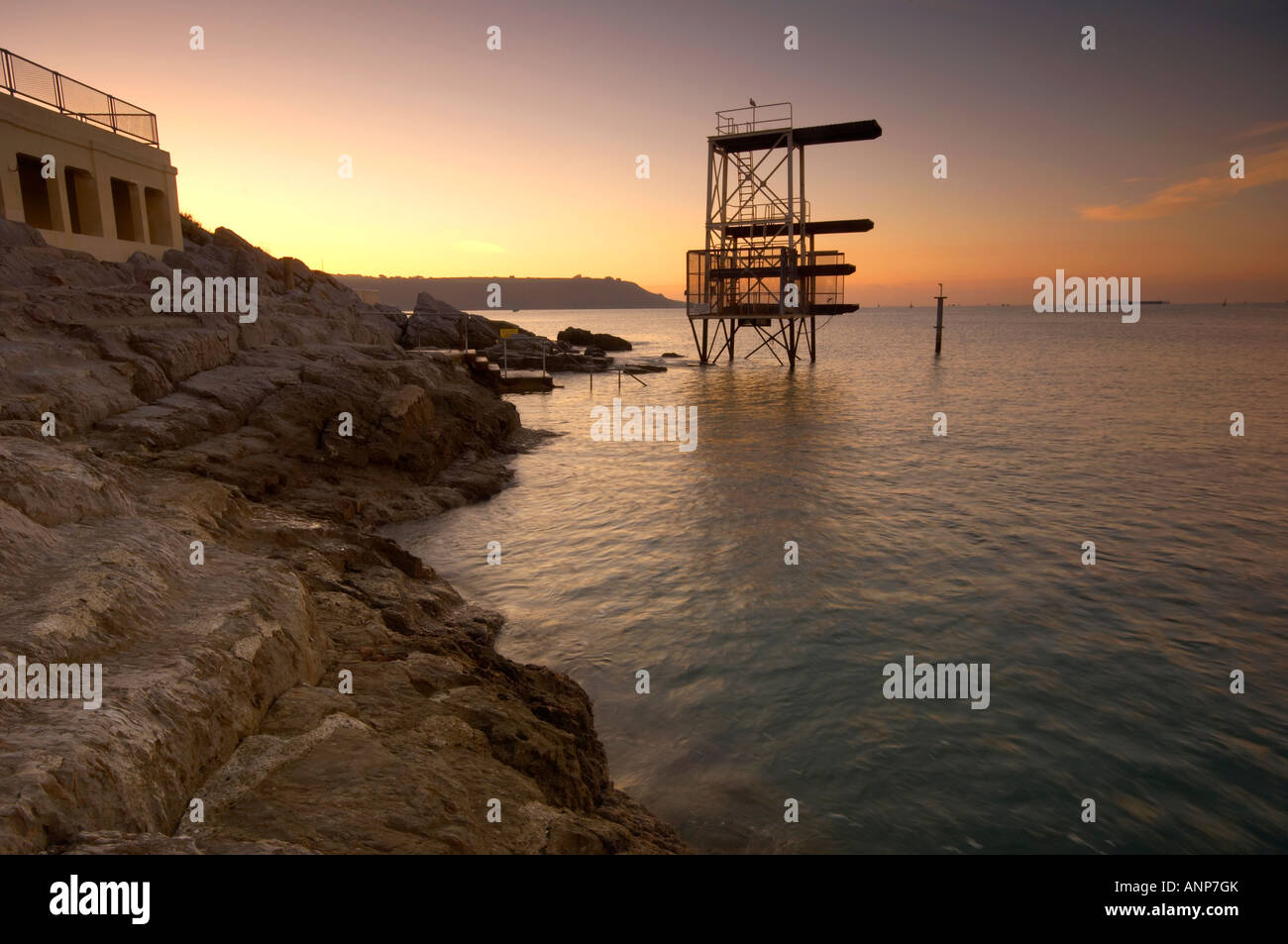 A rusty old diving board on the art deco seafront of Plymouth Hoe at