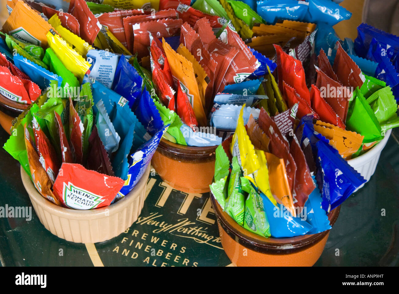 Plastic sachets of sauces in a pub restaurant Stock Photo Alamy