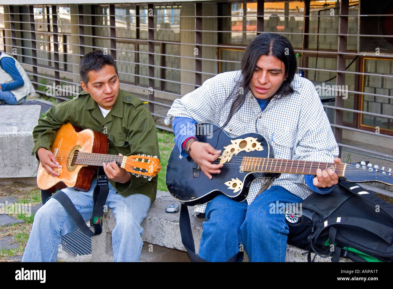 Mexican men playing acoustic guitars in Mexico City Mexico Stock Photo
