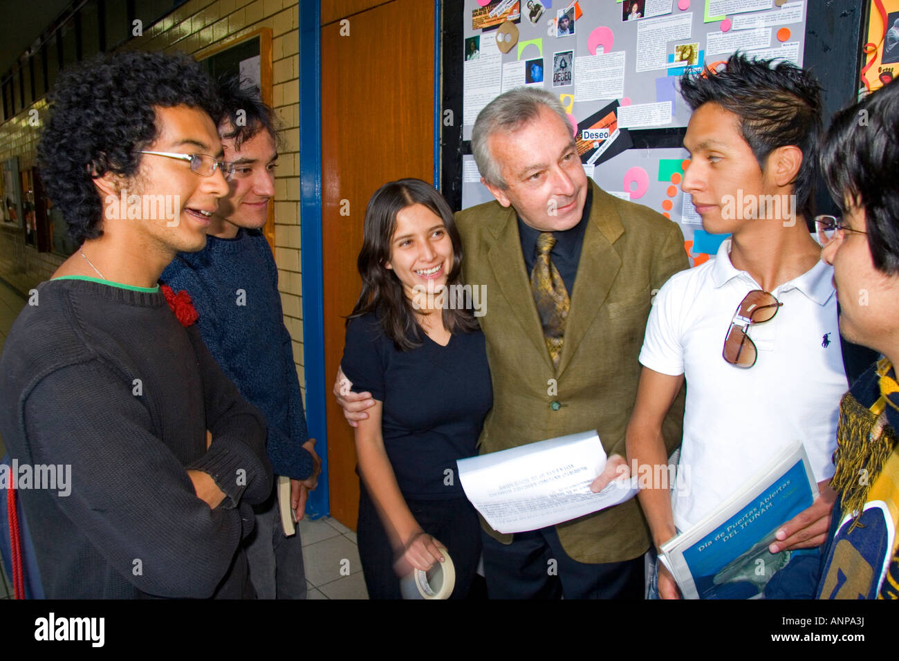 Professor speaking with students on the campus of the National Autonomous University of Mexico in Mexico City Mexico Stock Photo