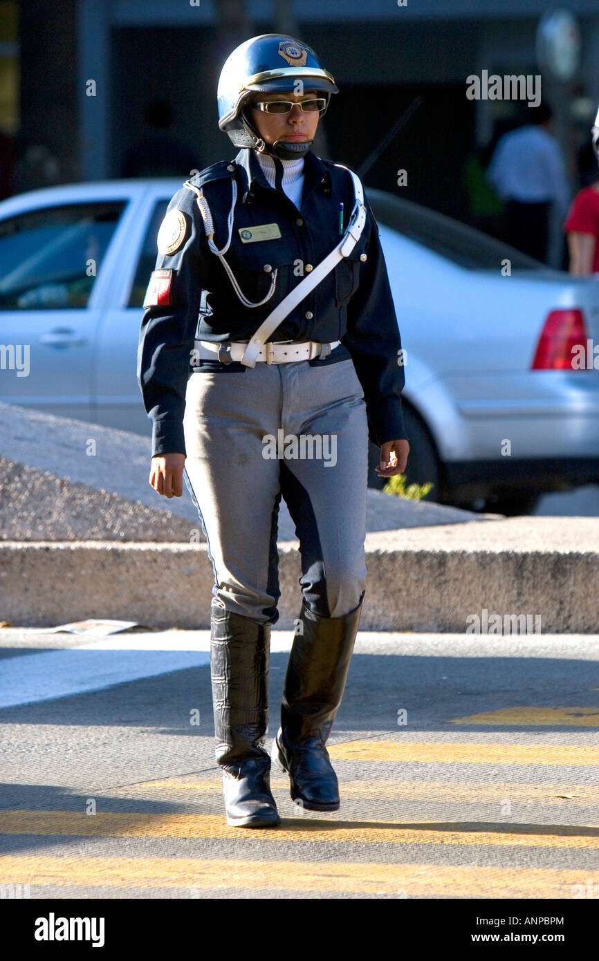 Female police officer on the street in Mexico City Mexico Stock Photo