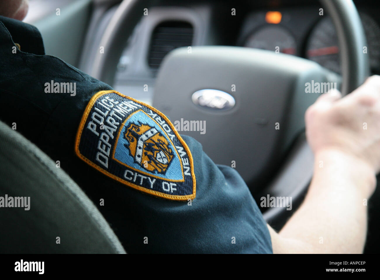 New York cop driving a police car Stock Photo