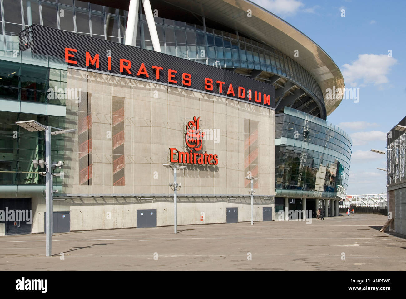 Part of exterior of the Arsenal Gunners FC football club sponsored by Emirates airline & there logo on sports stadium in Holloway London England UK Stock Photo