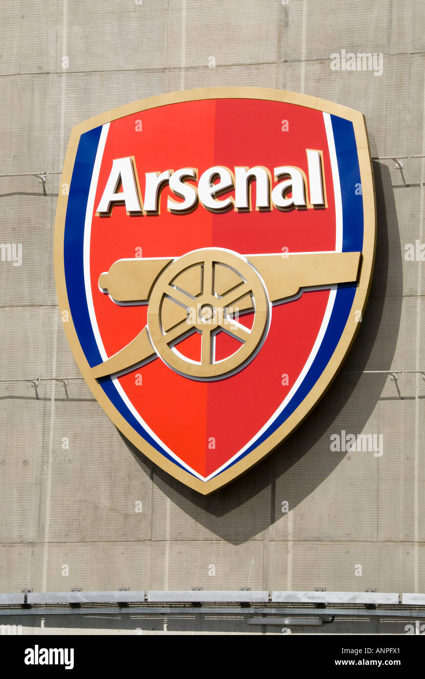 Arsenal Gunners football club Close up of team badge & business logo shield on wall of the Emirates sports stadium Holloway London England UK Stock Photo