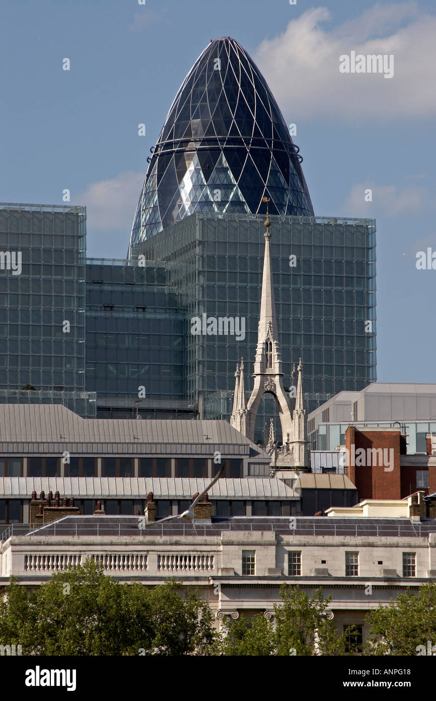 View north east across River Thames with rooftops of Custom House Plantation Place and Gherkin