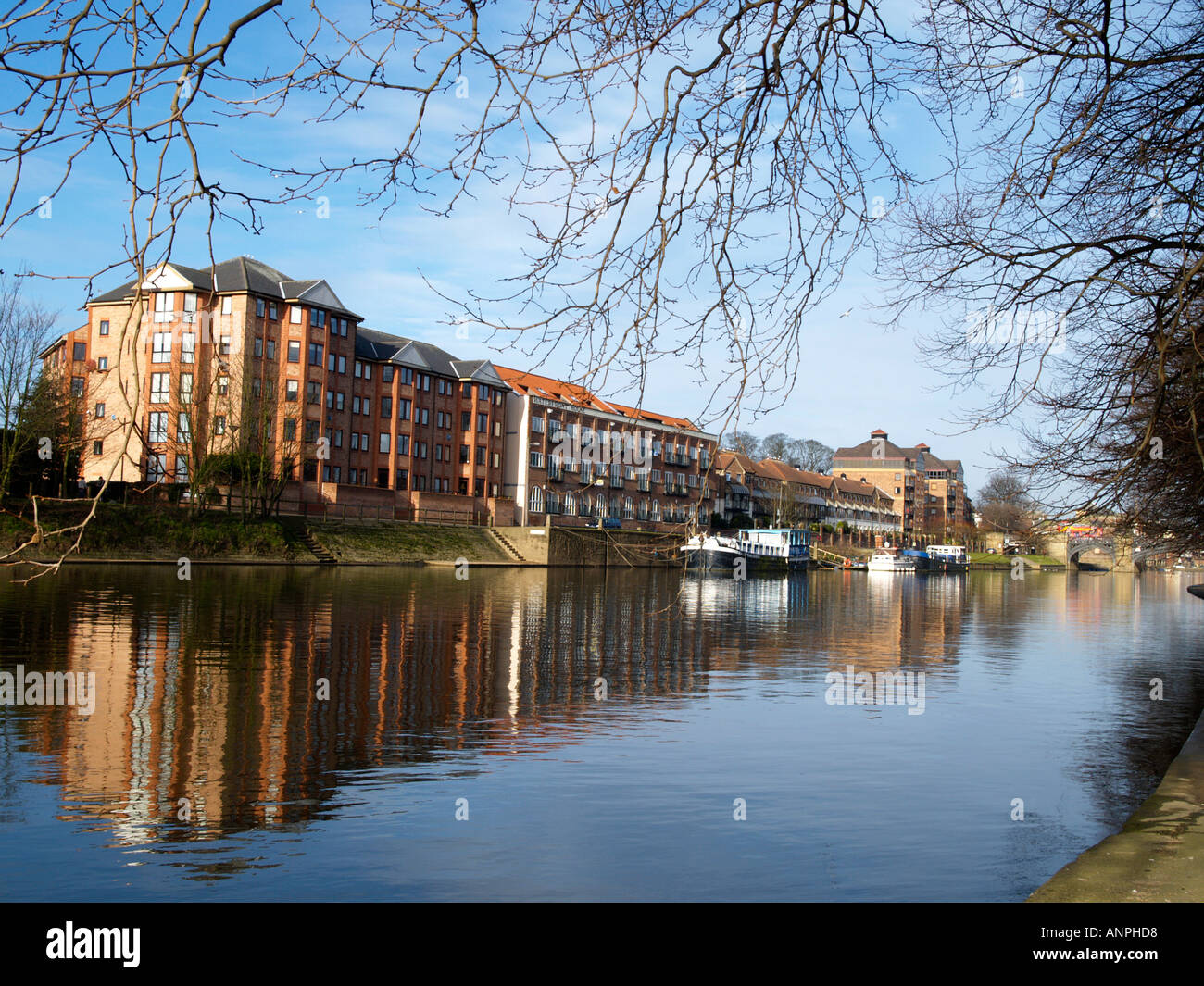 Modern apartment buildings along the river Ouse in the city of York UK