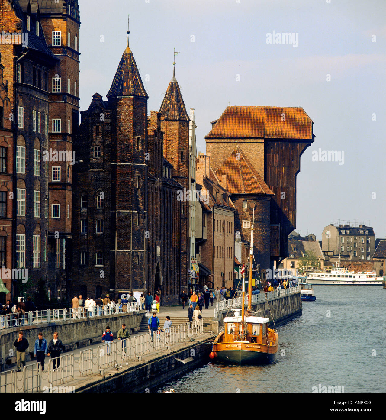 GDANSK CRANE GATE Old town buildings and crane gate on the banks of the River Motlawa Gdansk Poland Stock Photo