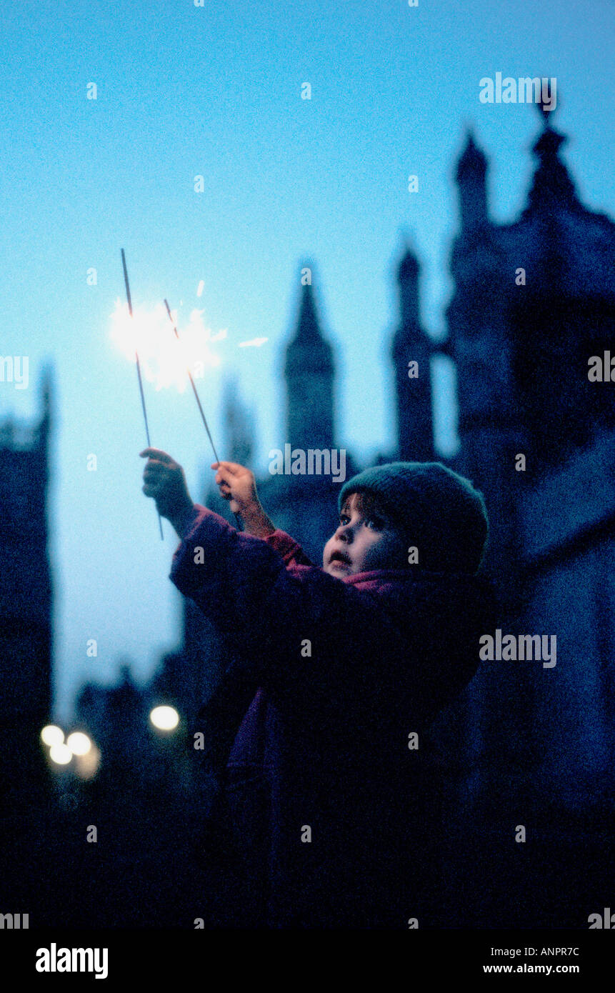 Young girl holding a sparkler on Guy Fawkes Night Stock Photo