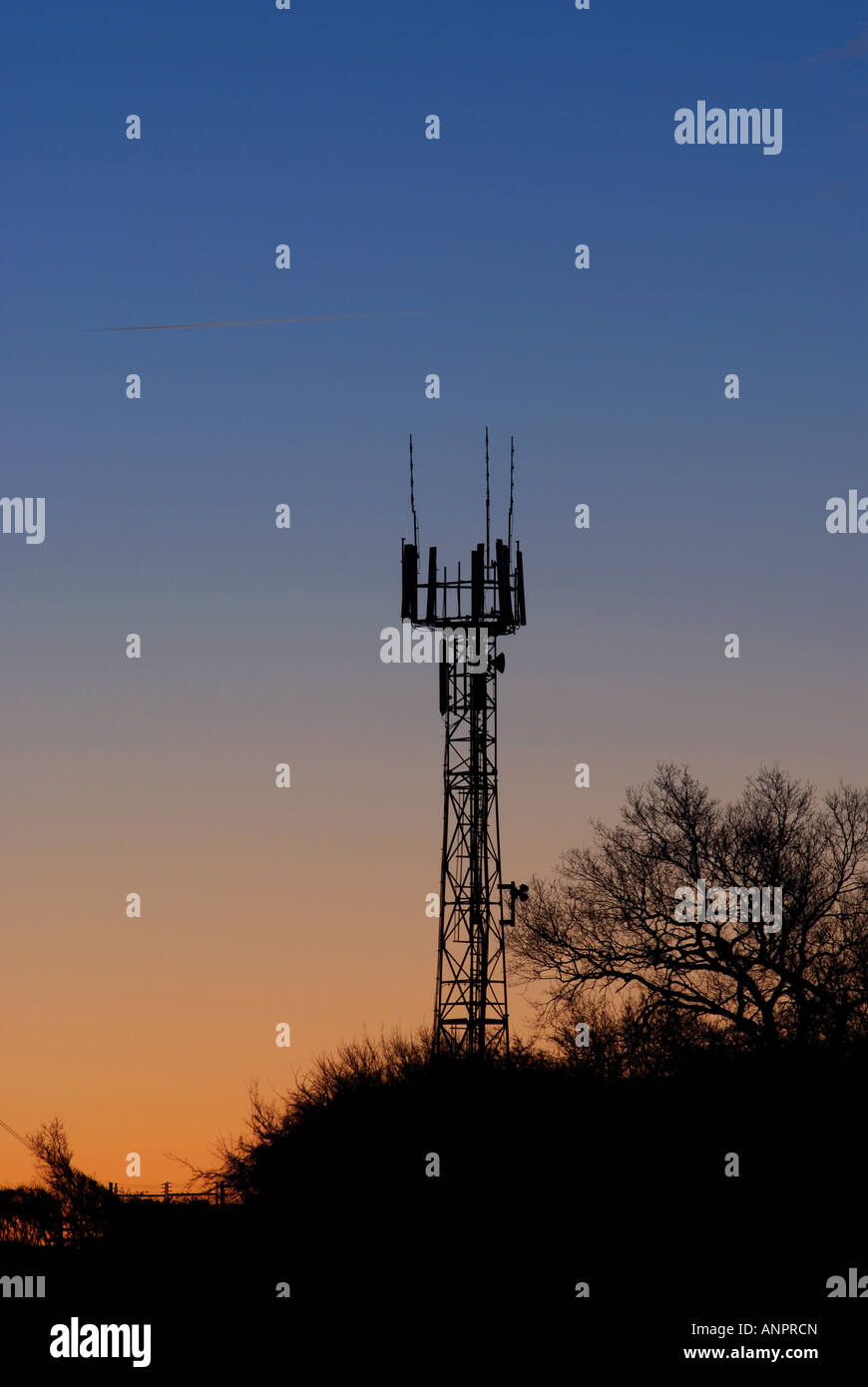Mobile phone mast at dawn, UK Stock Photo Alamy