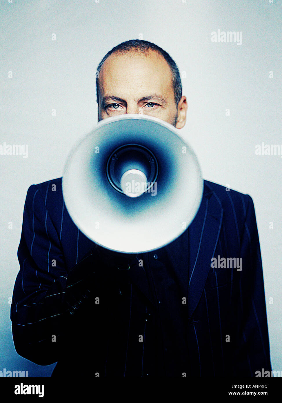 Man using a megaphone Stock Photo Alamy