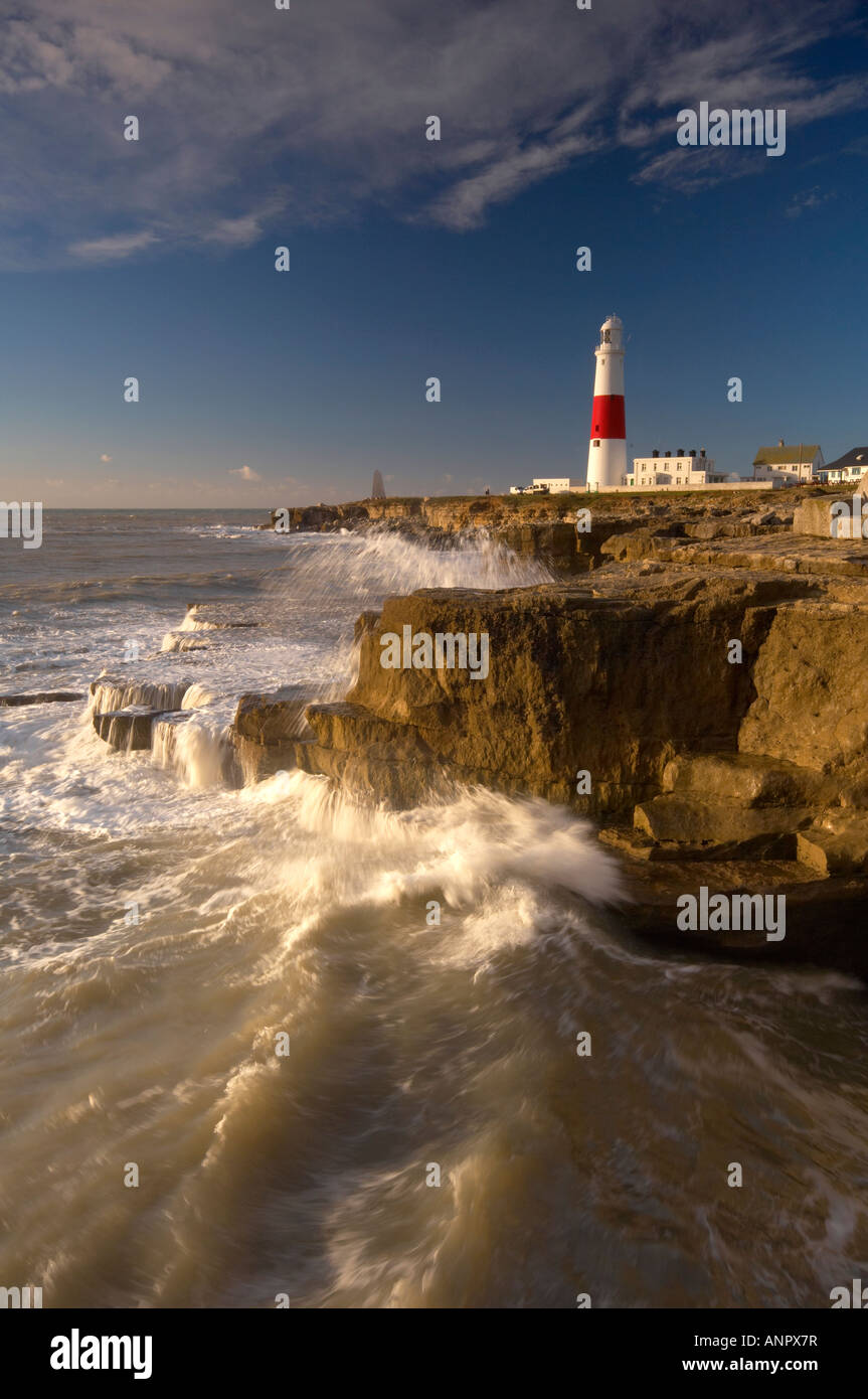 Rough seas crashing into the shoreline at Portland Bill lighthouse Dorset UK Stock Photo