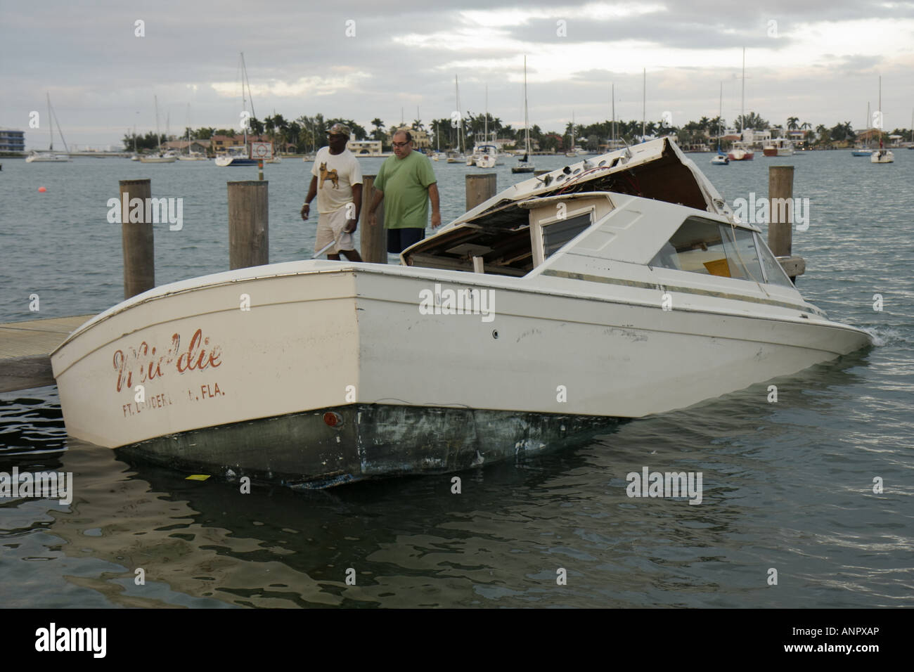 Miami Florida Biscayne Bay Water Watson Island Public Boat Launch Sunken Damage Adult Adults Man