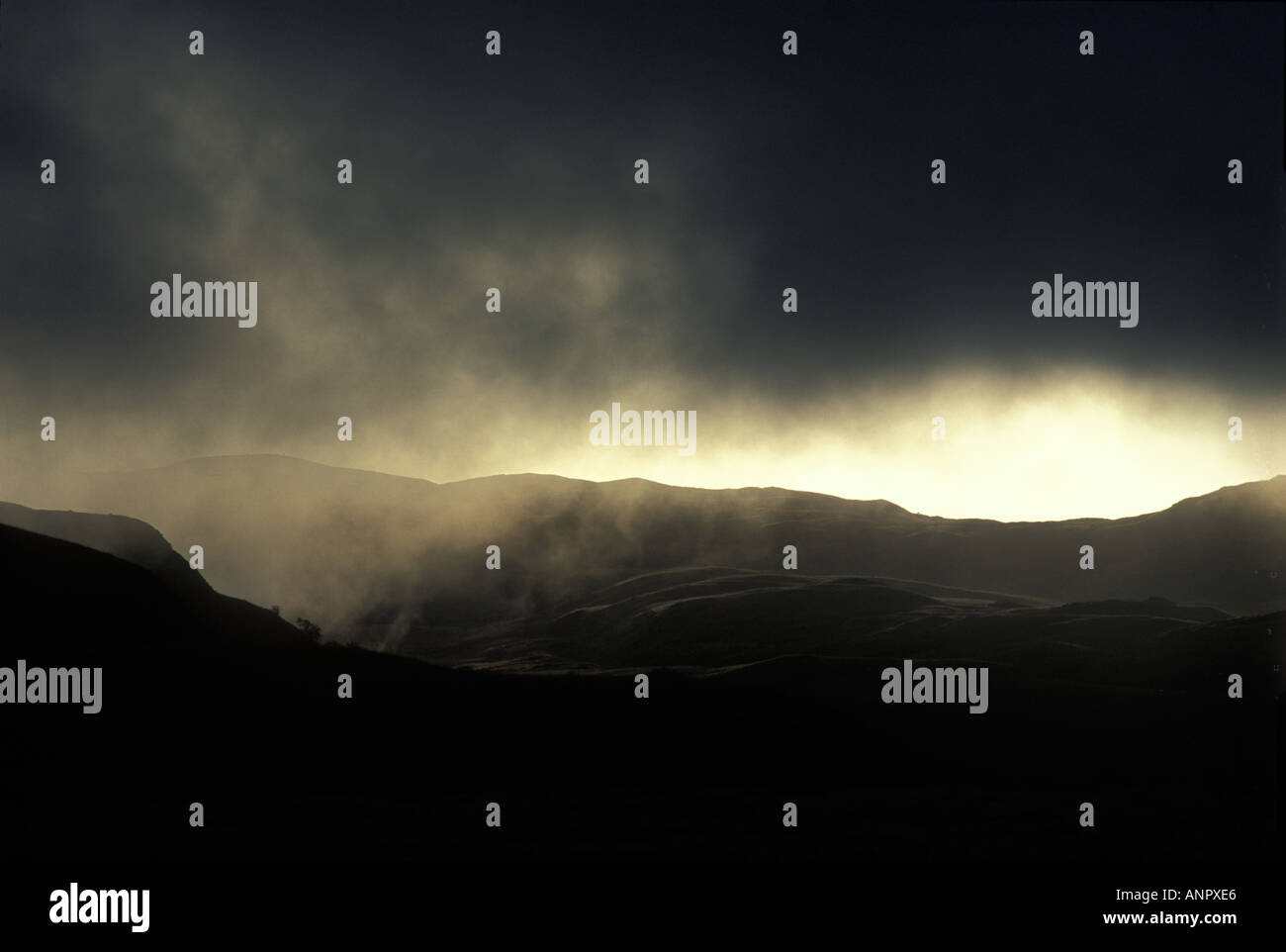 Storm Clouds Over Mountains Stock Photo