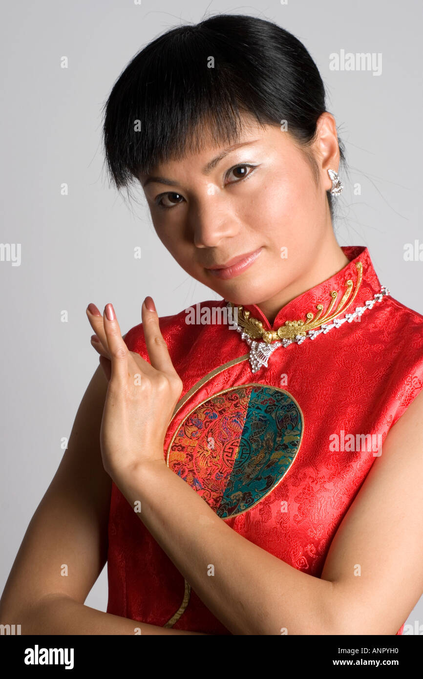 Beautiful Chinese woman in traditional red dress Stock Photo - Alamy