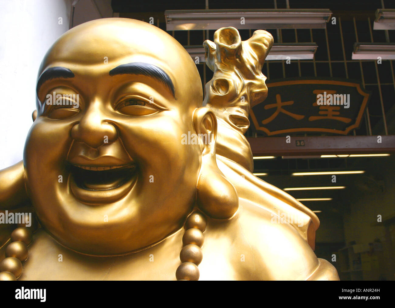 Laughing buddha hires stock photography and images Alamy