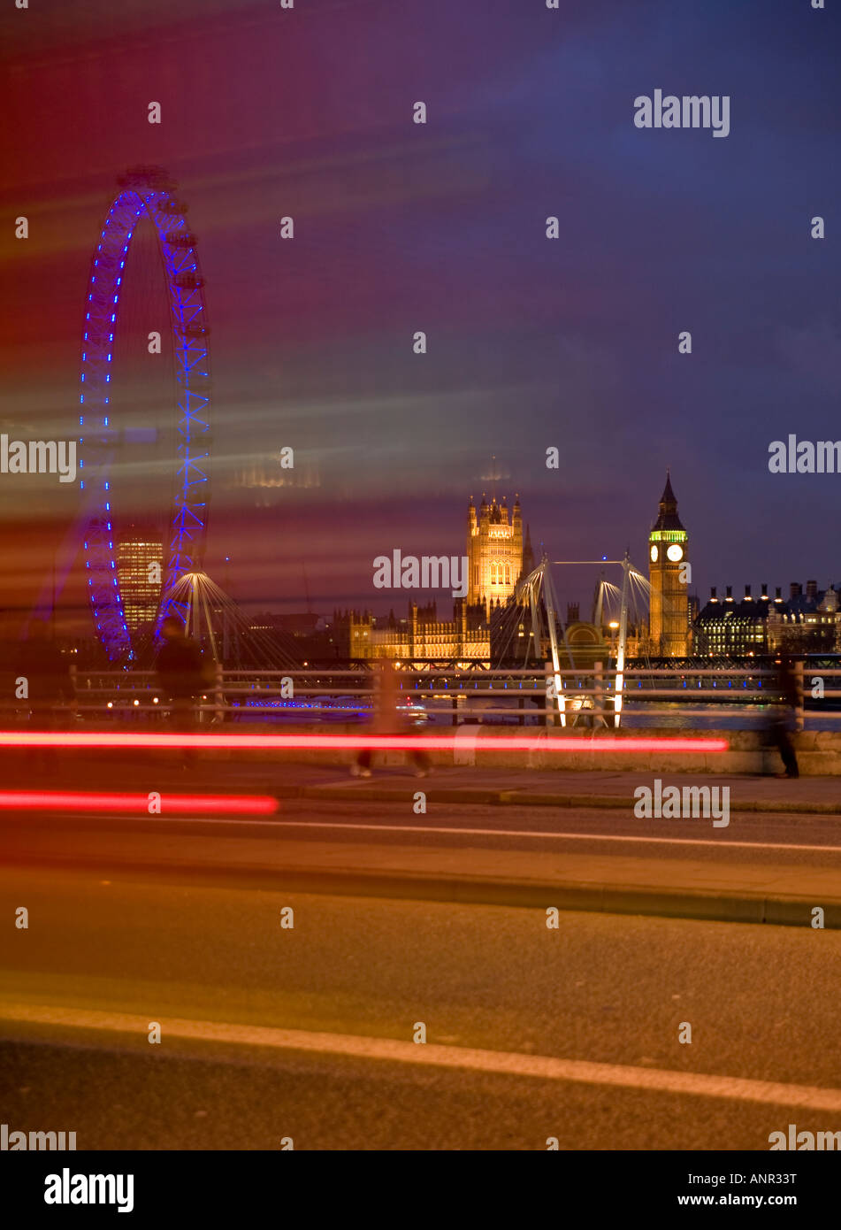 motion blur effect pf traffic at night on Waterloo Bridge with Houses of parliament backdrop Stock Photo