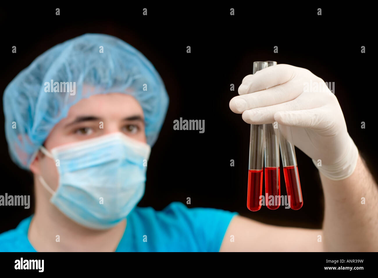 Lab technician examining blood samples Stock Photo Alamy