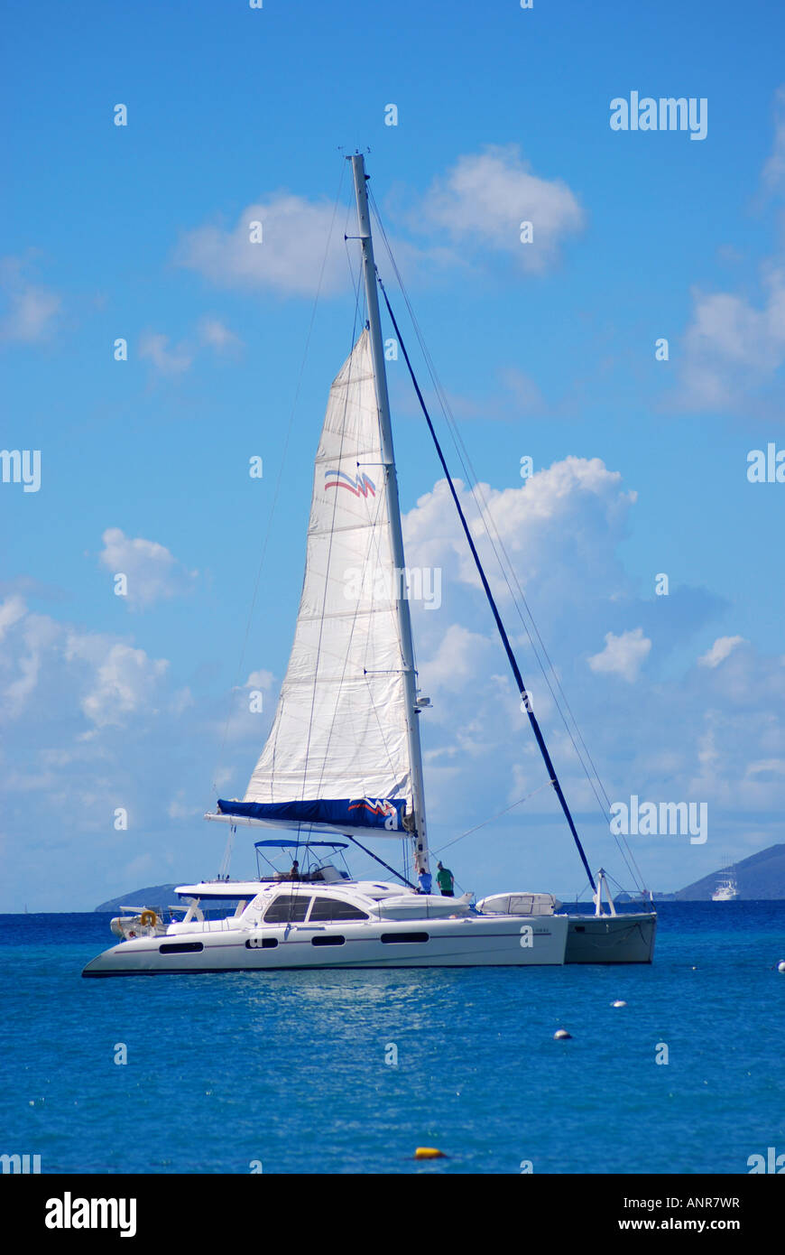 Catamaran off Long Bay Beach, Antigua, Caribbean Stock Photo