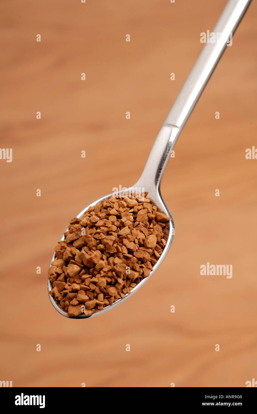Instant coffee granules on teaspoons Stock Photo Alamy