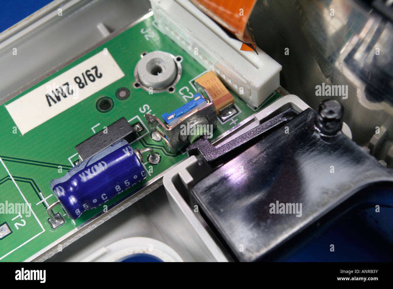 Inside components of a barcode scanner, trigger switch Stock Photo Alamy