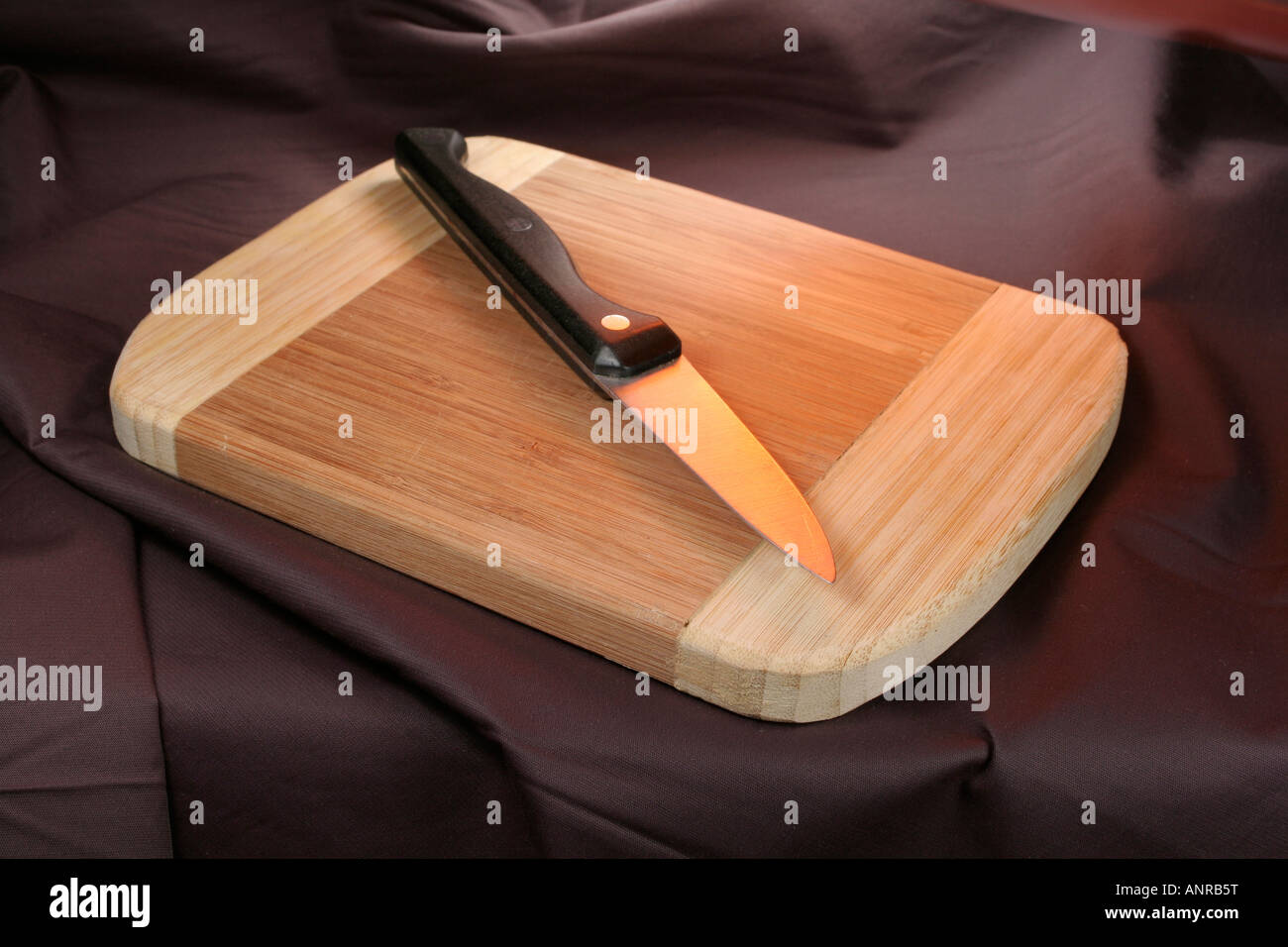 Small cutting board with knife Stock Photo Alamy