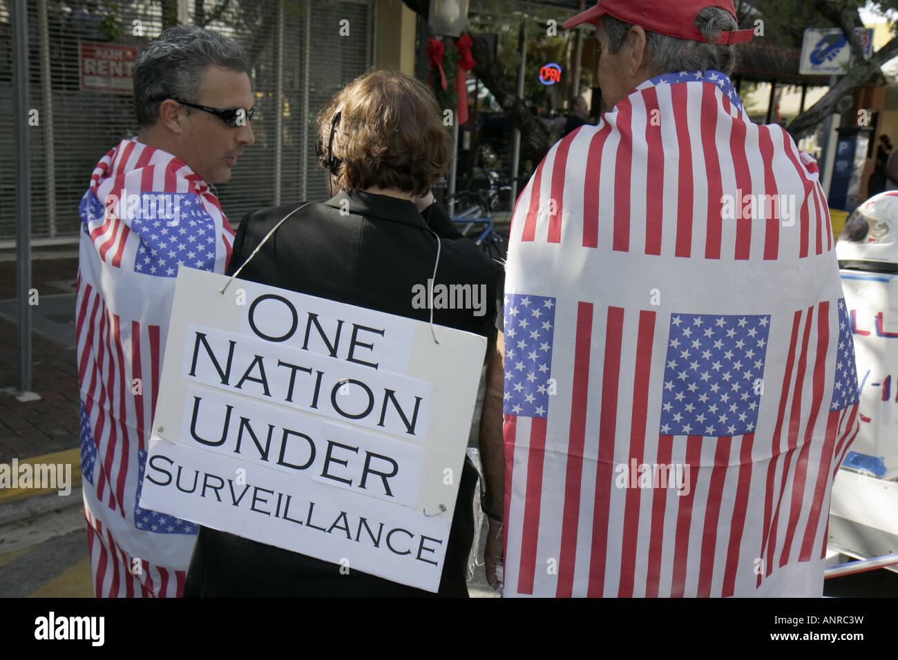 Miami Florida,Coconut Grove,King Mango Strut,annual satire parade,funny,humor,humorous,humour,humorous,spoof,parody,sign,surveillance,Patriot Act,Amer Stock Photo