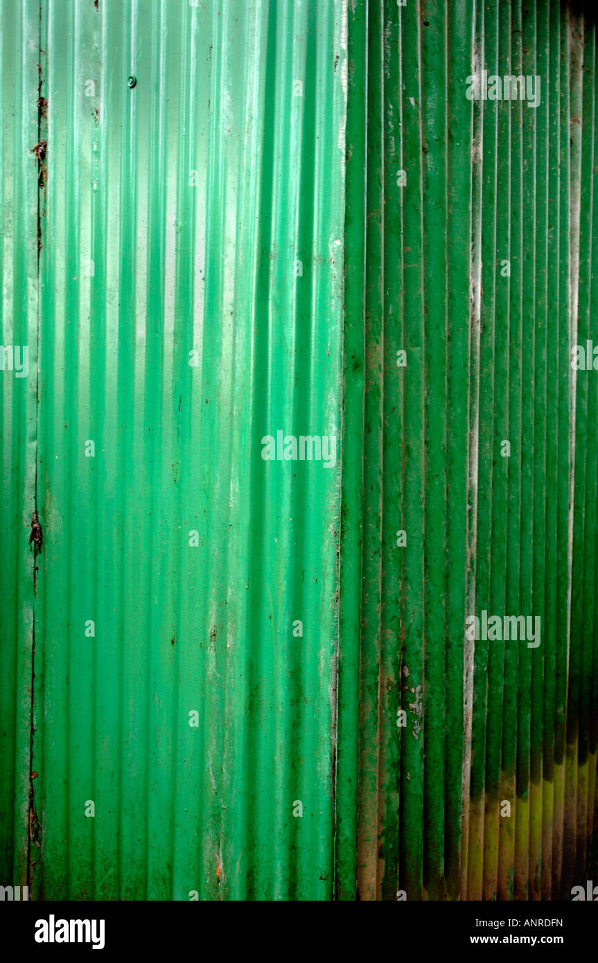 Green Coloured Coruggated Building. Stock Photo