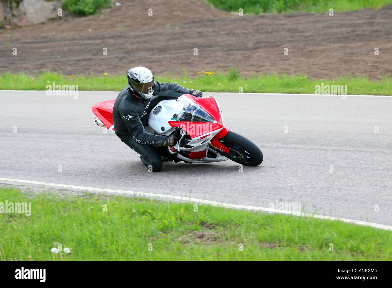 Superbike on racetrack Stock Photo - Alamy