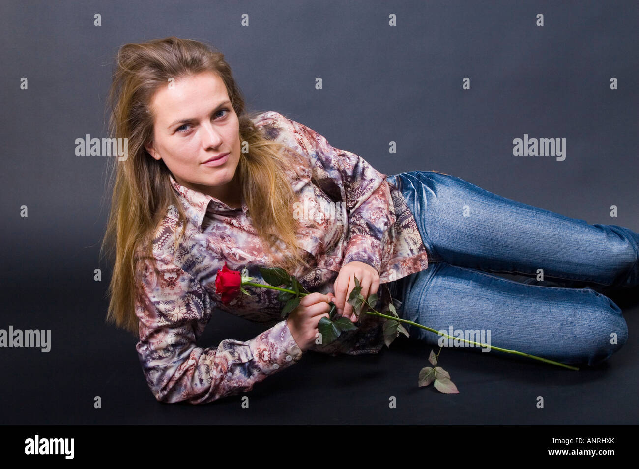 Miryam with rose lying Stock Photo - Alamy