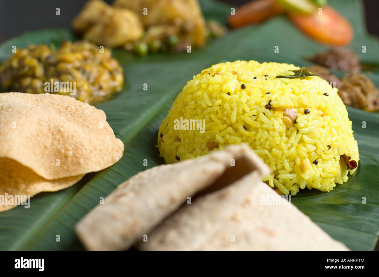 Indian cuisine served on a banana leaf Stock Photo