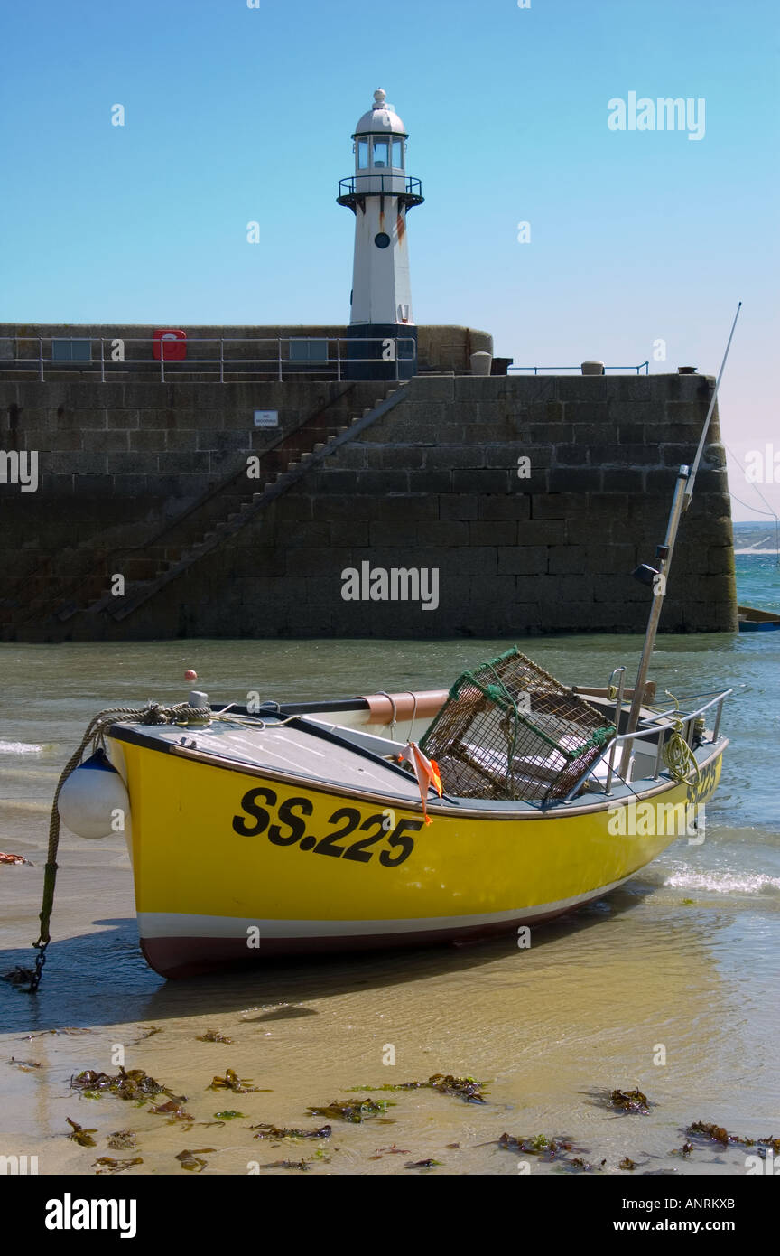 St Ives Lighthouse and Fishing Boat Stock Photo Alamy