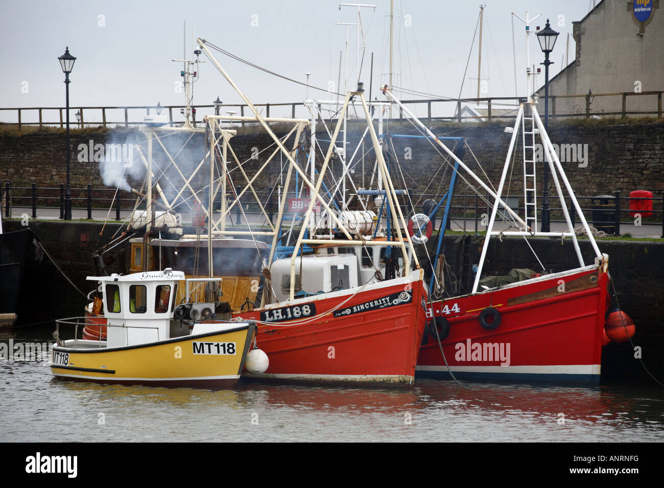 Fishing boats in maryport harbour hi-res stock photography and images ...