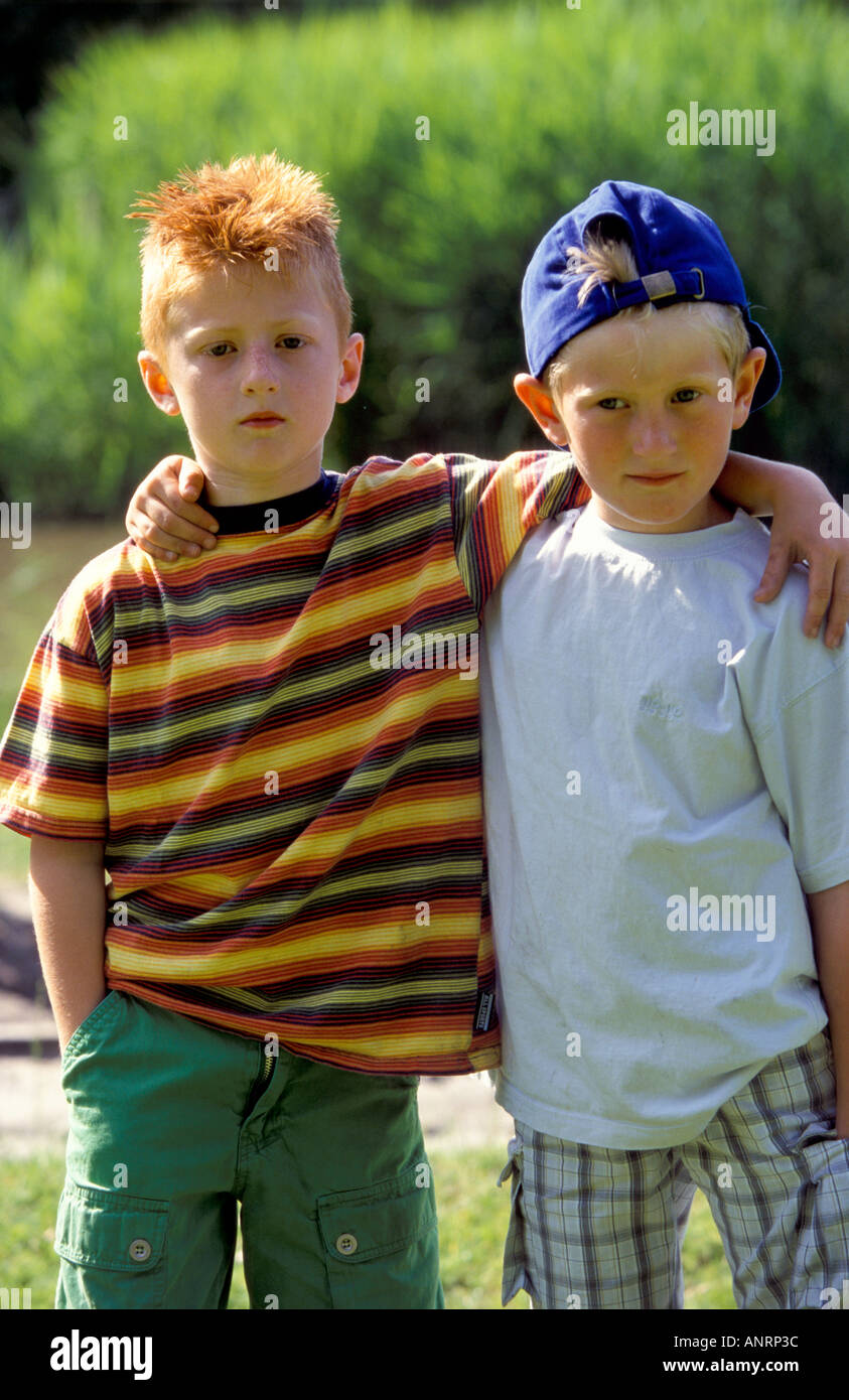 Two boys standing together Stock Photo