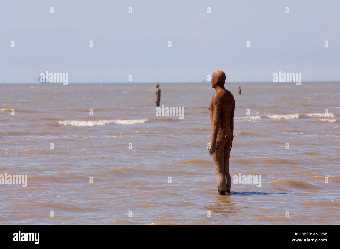 Another Place public sculpture on Crosby Beach Sefton coast UK Stock Photo Alamy