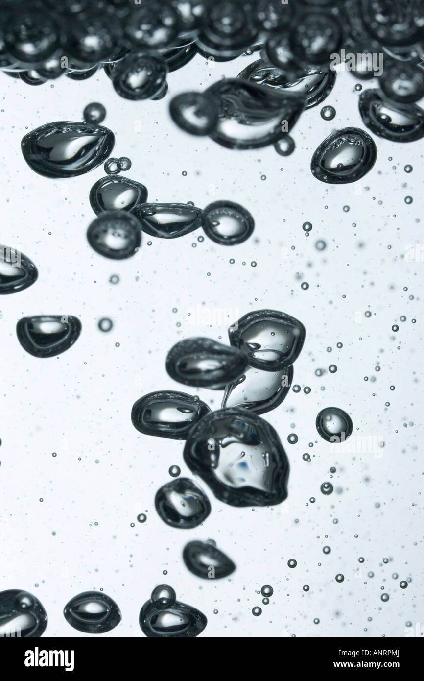 air / gas bubble rising in a liquid Stock Photo
