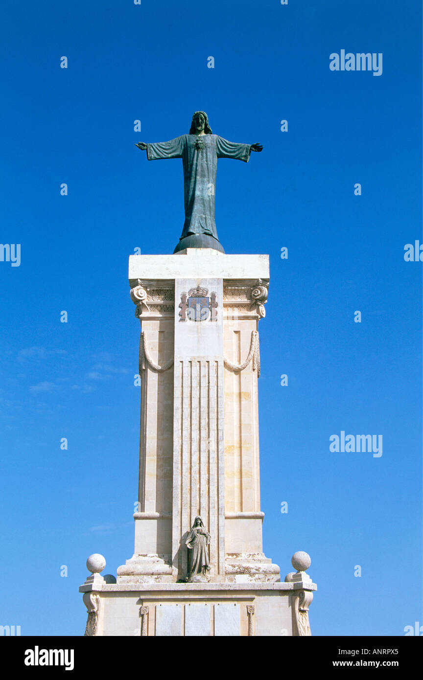 The statue of Christ which tops a plinth at the convent which is set on top of Monte Toro Stock Photo