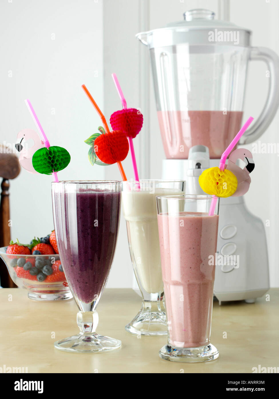 https://c8.alamy.com/comp/ANRR3M/blender-and-banana-strawberry-and-blueberry-mango-smoothies-healthy-ANRR3M.jpg