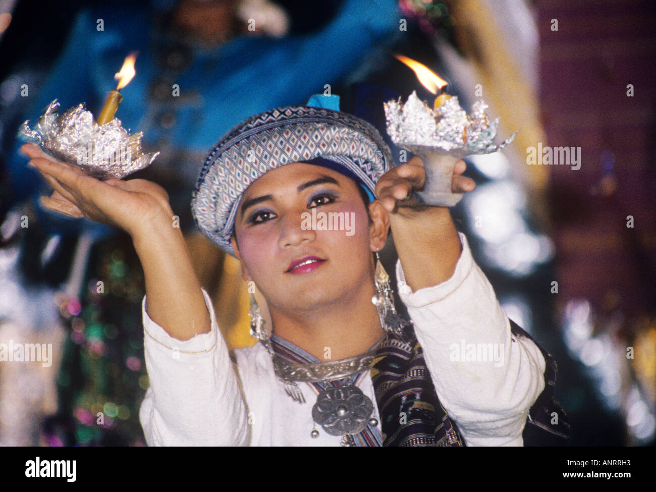 A Thai man dressed in woman s costume with make up and jewellery