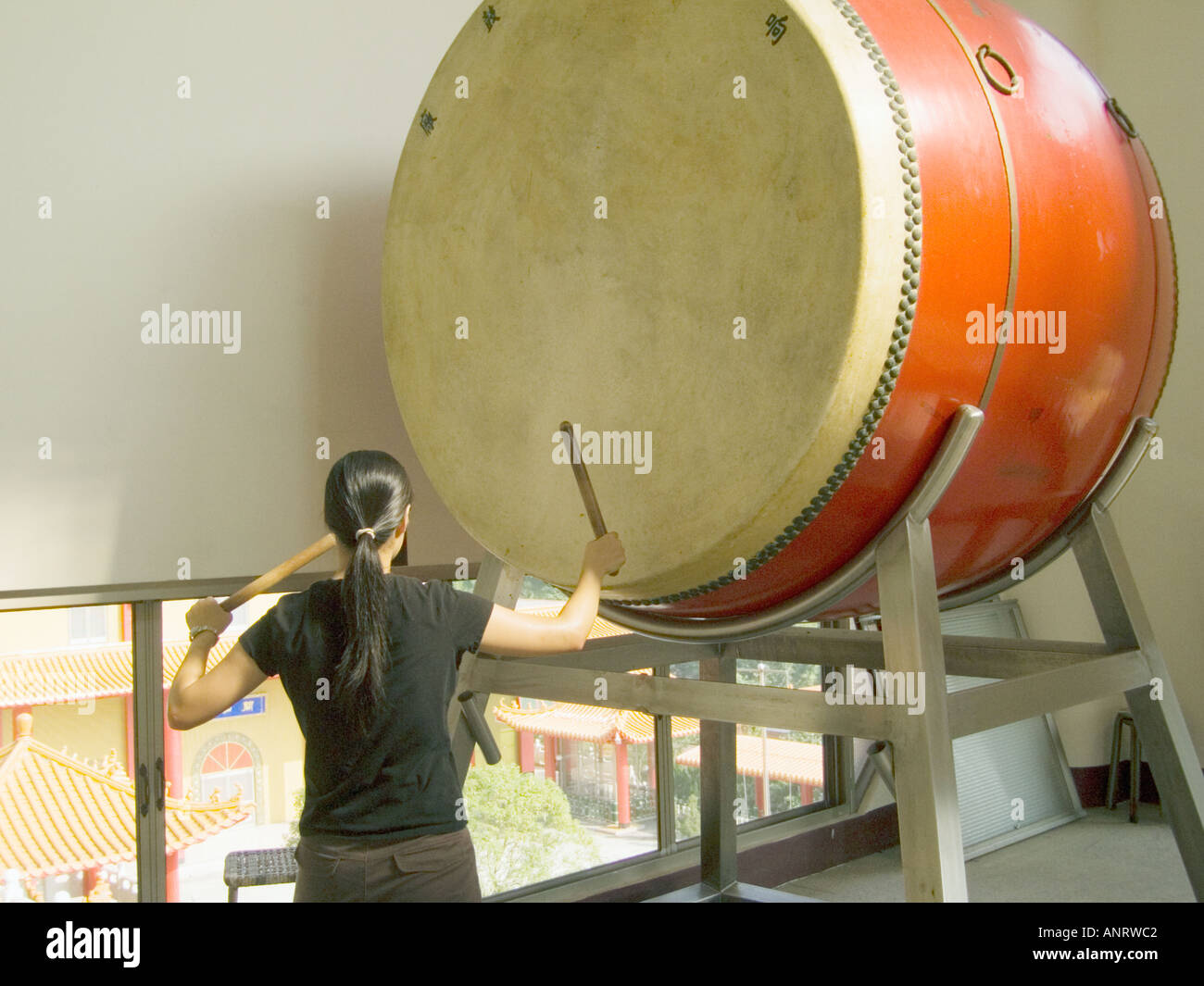Girl Beating Giant Taiko Drum In Buddhist Temple Taiwan China Stock Photo -  Alamy