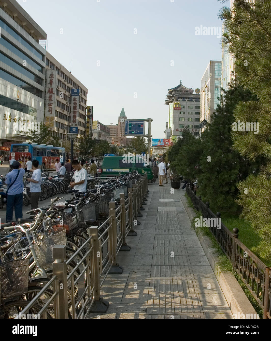 Bicycles parked on Wang Fu Jing avenue, affluent area of  Beijing, China Stock Photo