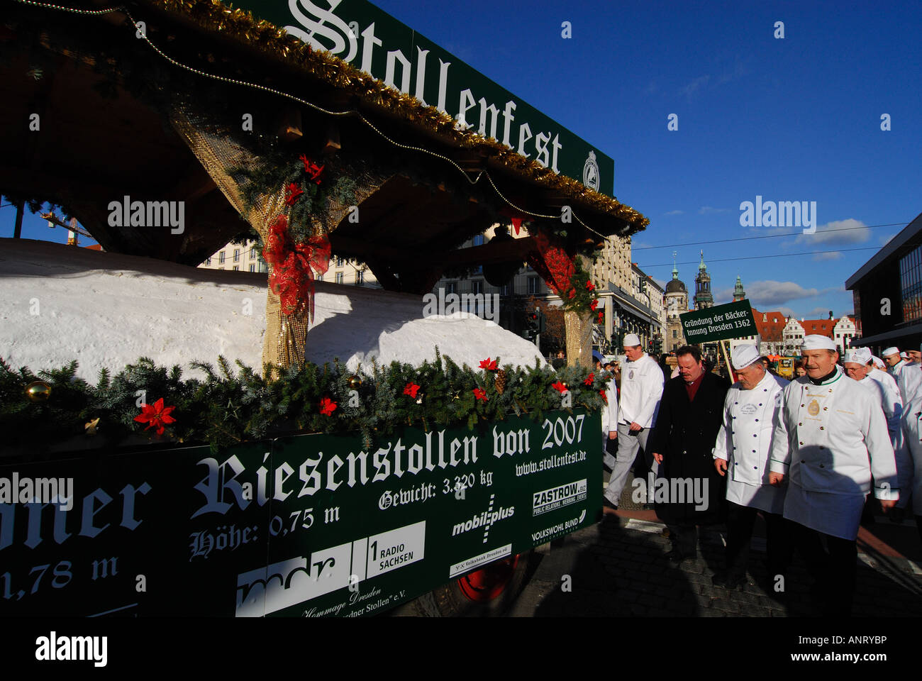 Giant Stollen cake being wheeled through streets of Dresden, Germany Stock Photo
