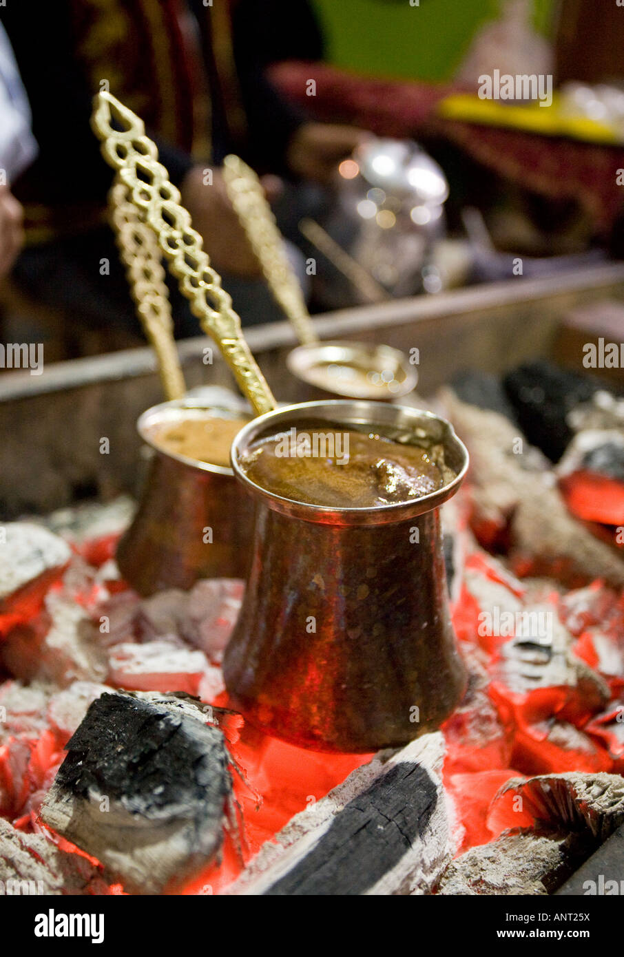 Traditional Turkish Coffee on the boil Three pots of turkish coffee